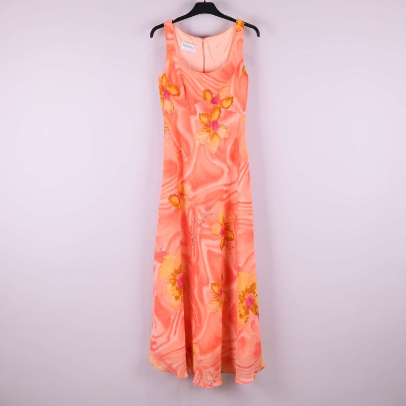 Lång ärmlös klänning med blommigt mönster framtill