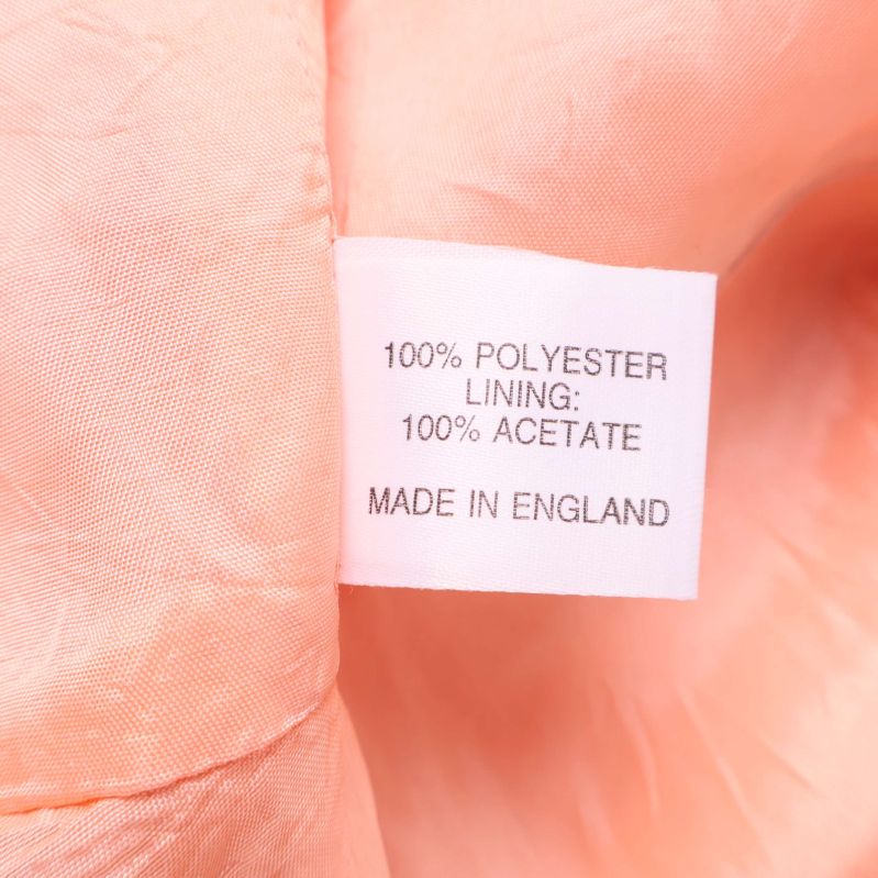 Materialetikett med 100% polyester och acetatfoder