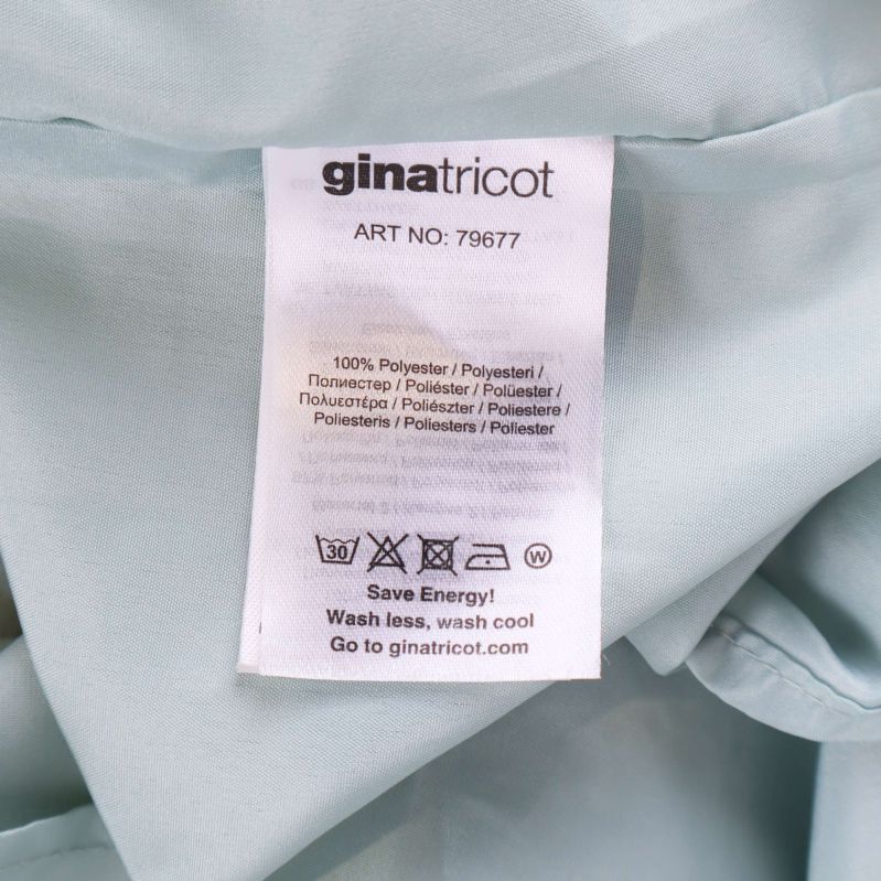 Materiallapp med information om 100% polyester