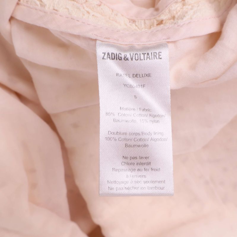 Materialetikett med materialinformation och tvättråd