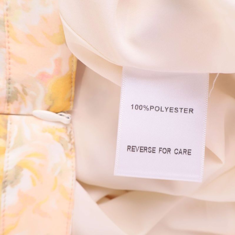 Materiallapp med text 100% polyester