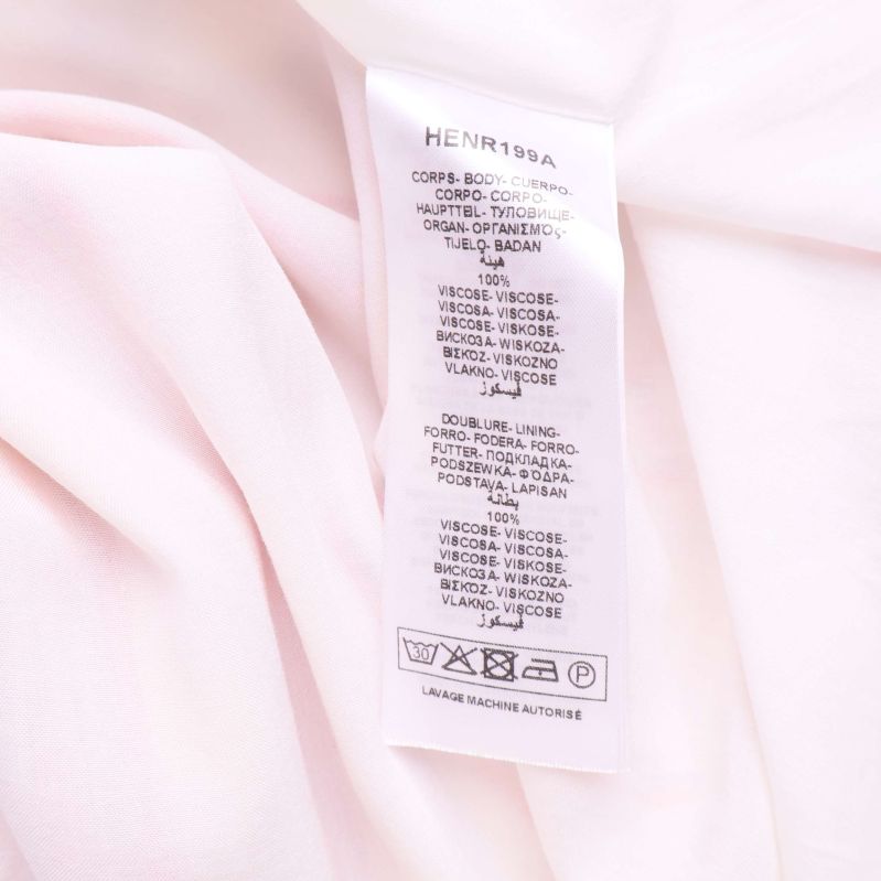 Material- och tvättmärkning med 100% viskos