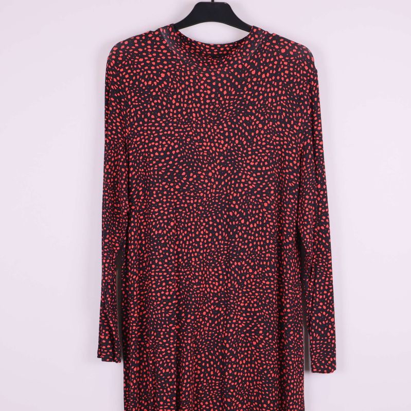 Överdel av klänning med långt ärm och prickigt mönster