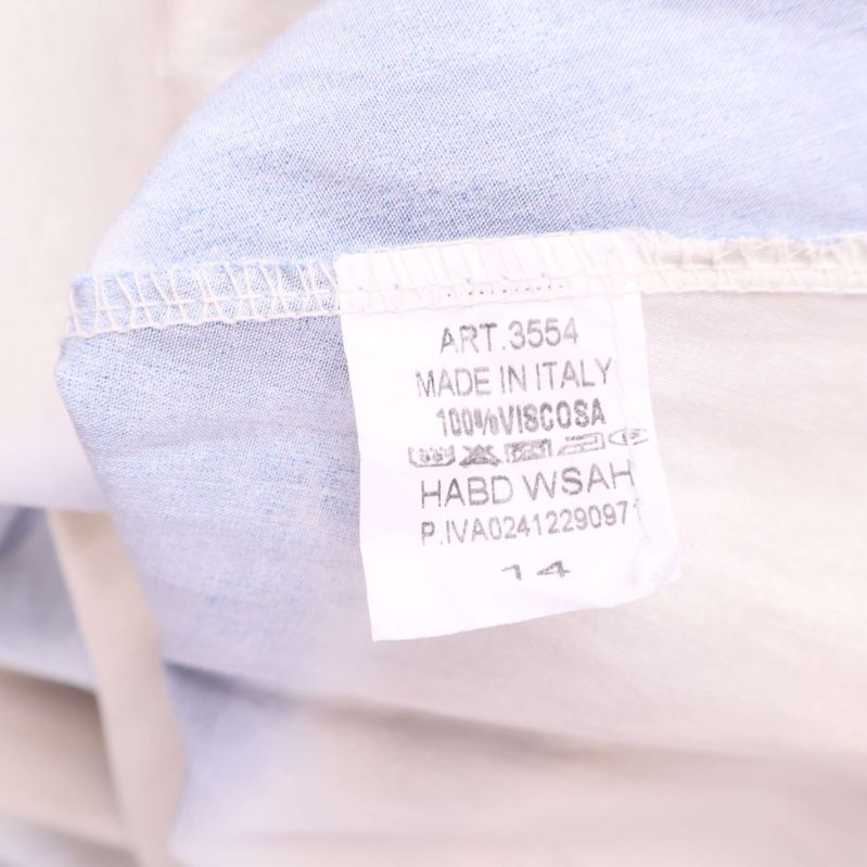 Materiallapp som visar 100% viskos tillverkad i Italien