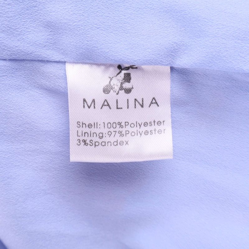 Materialetikett som visar polyester och spandexblandning