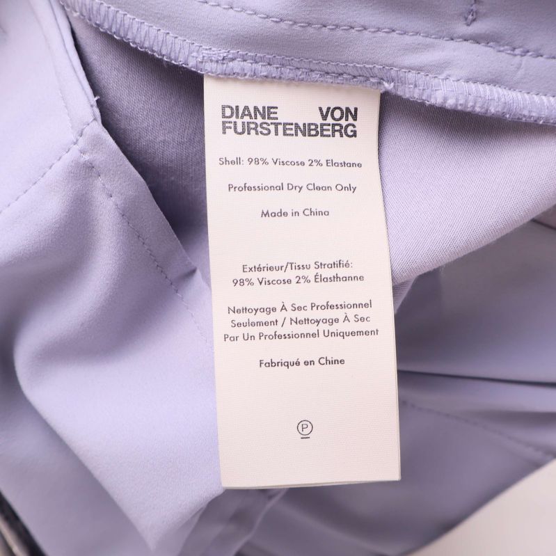 Materialetikett som visar 98% viskos och 2% elastan