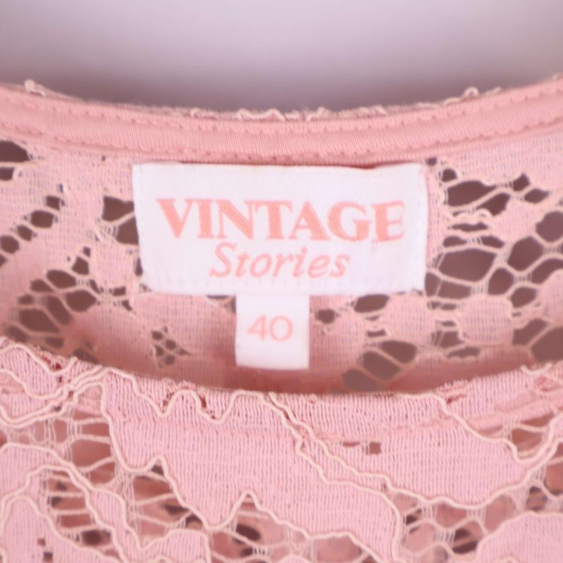 Närbild på etikett Vintage Stories storlek 40