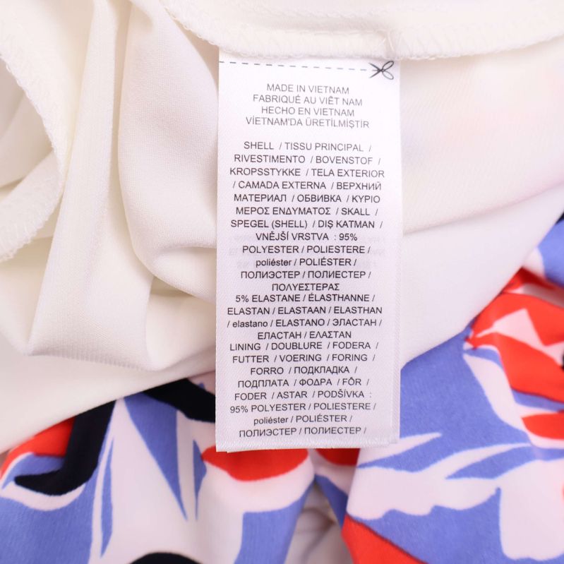 Materiallapp med information om polyester och elastan