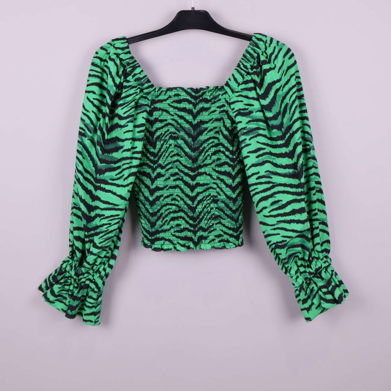 Grön topp med svart zebramönster och puffärmar