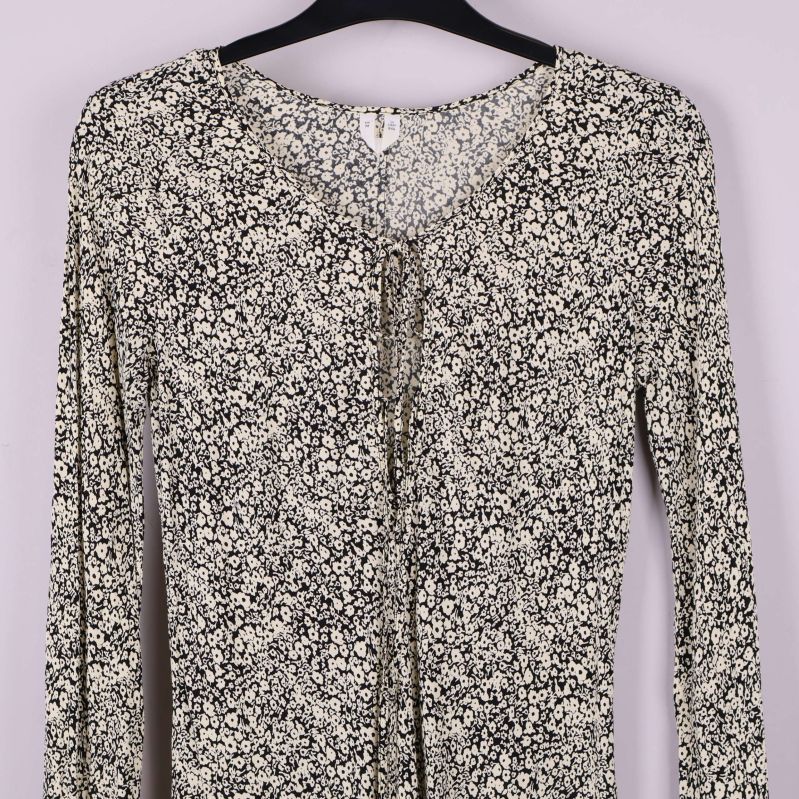 Överdel av blommig klänning med knyt och rund hals