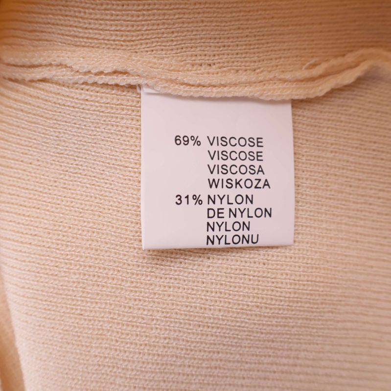 Materiallapp visar 69% viskos och 31% nylon
