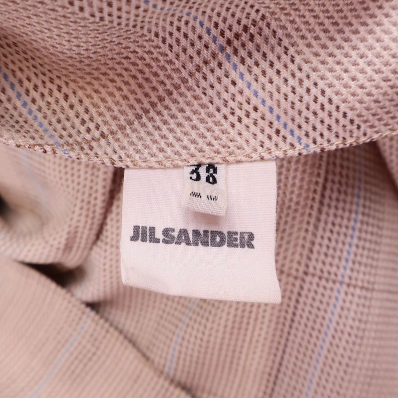 Storleksetikett 38 Jil Sander+ i kavajens foder