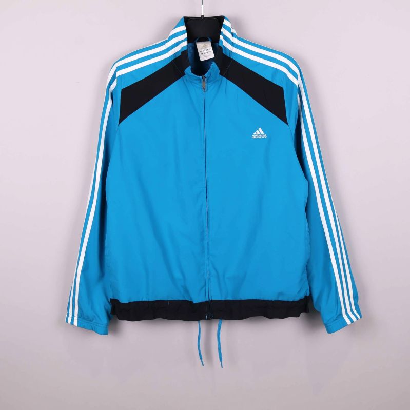 Blå Adidas sportjacka med tre vita ränder på ärmarna