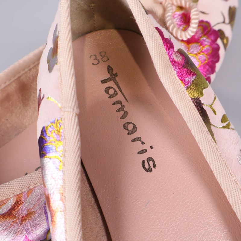 Närbild på Tamaris logga och storleksmärkning 38 i skons innersula