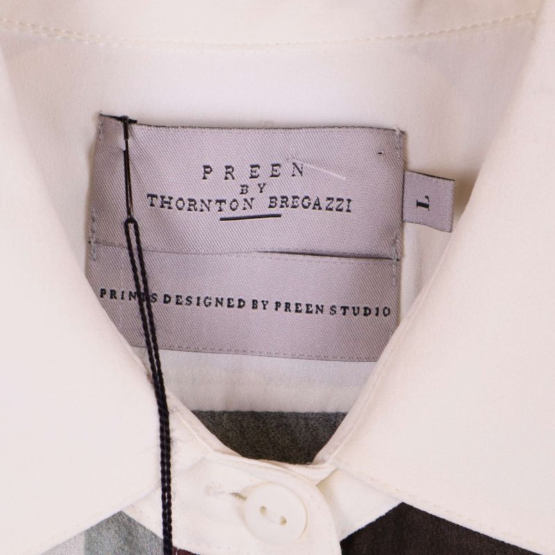 Etikettdetalj på Preen by Thornton Bregazzi blus