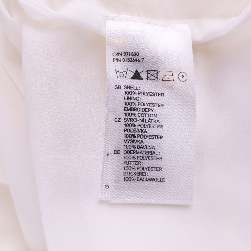 Materialetikett med komposition på olika språk