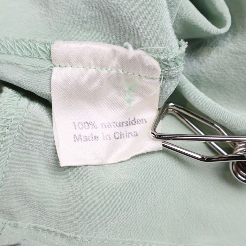 Materiallapp med texten 100% natursiden