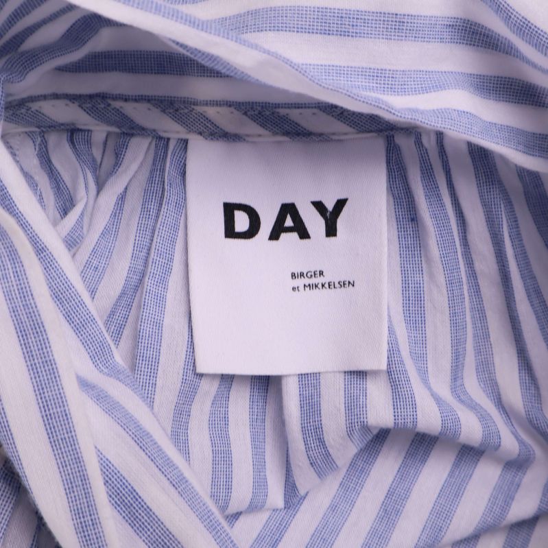 Närbild av DAY Birger et Mikkelsen logotyp på nacketikett