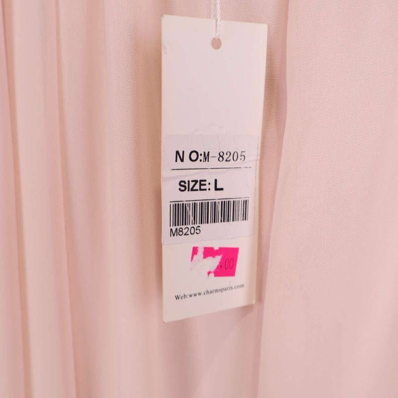 Storleksetikett på klänning med storleken L