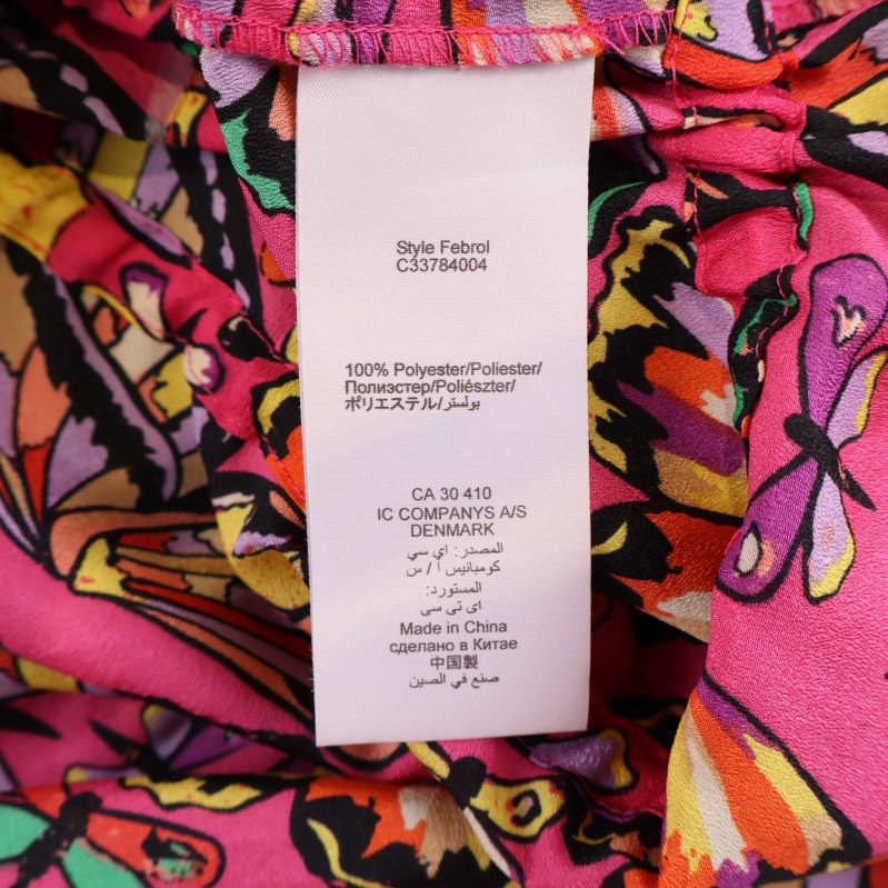 Materialetikett visar 100% polyester