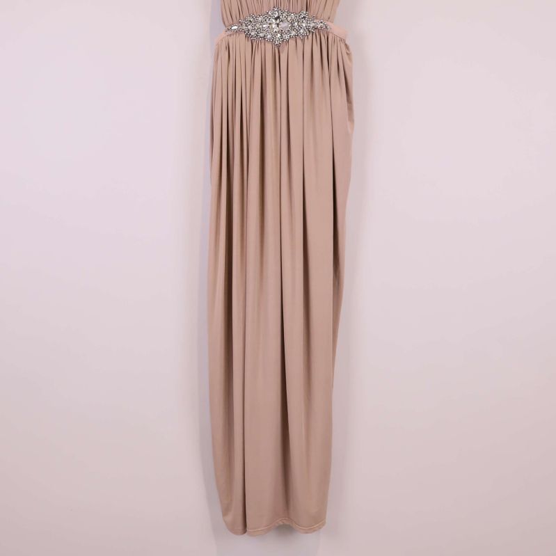 Nedre delen av långt beige kjolstycke