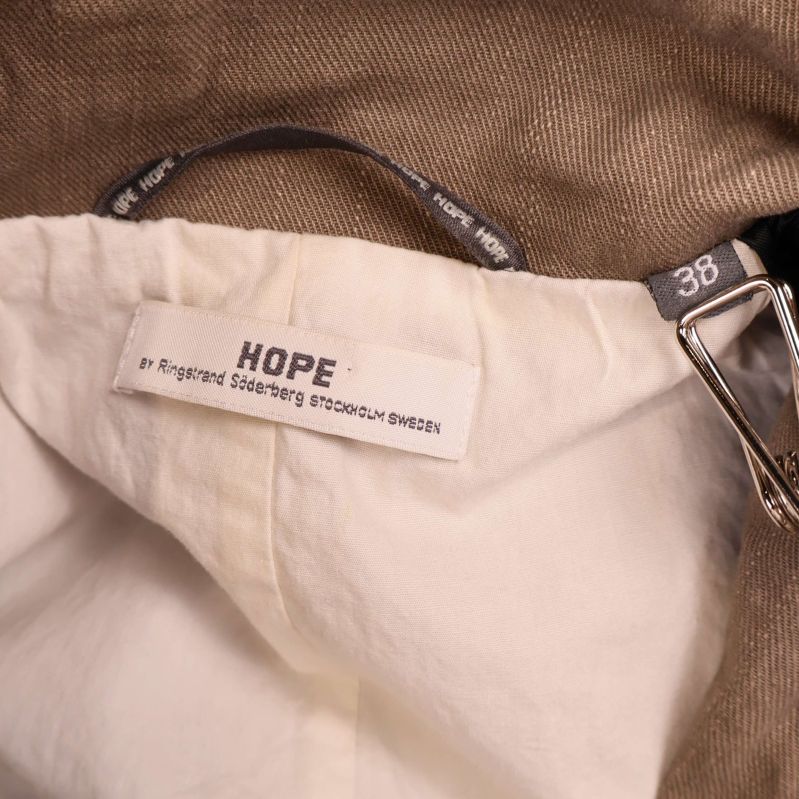 Inneretikett med Hope-logotyp och storlek 38