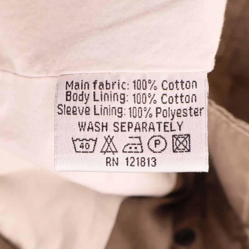 Materiallapp med information om bomull och polyester