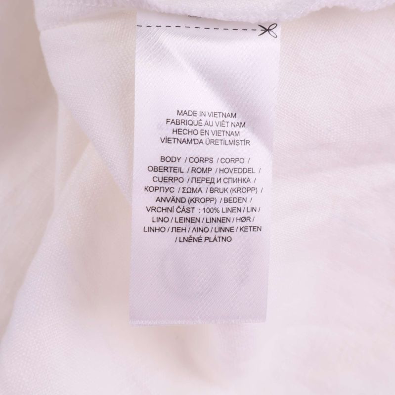 Materiallapp med information om 100% linne