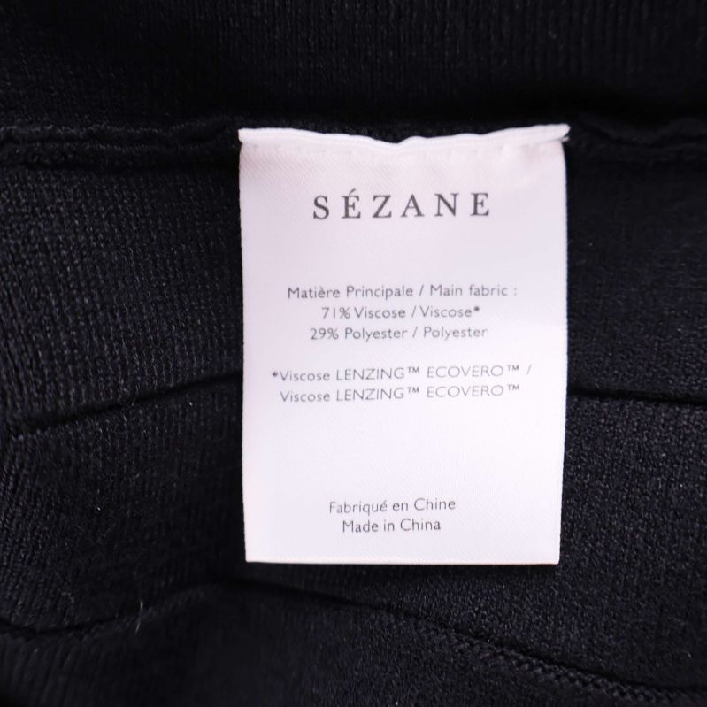 Materiallapp med komposition och Sézane-logga