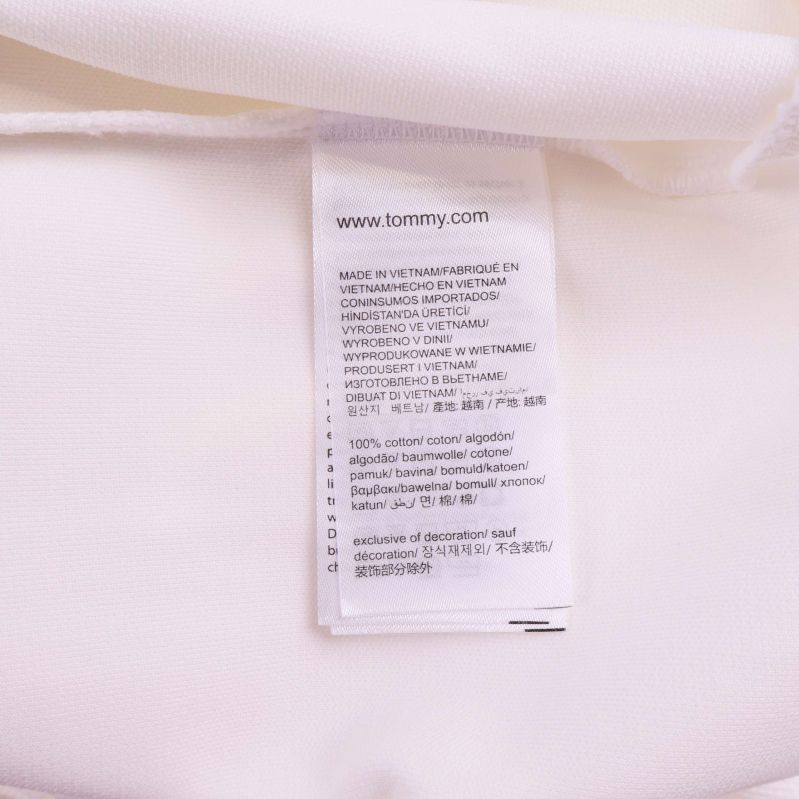 Materiallapp med information om komposition och skötselråd
