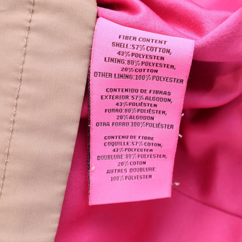Materialetikett som visar bomull och polyester