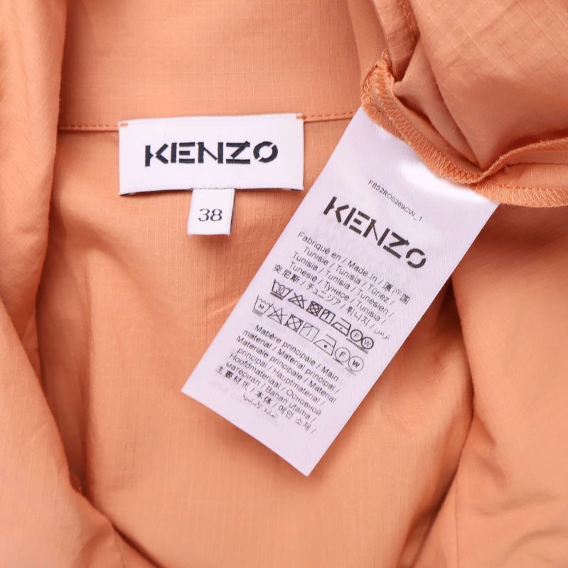 Kenzo etikett och materiallapp inuti aprikos klänning