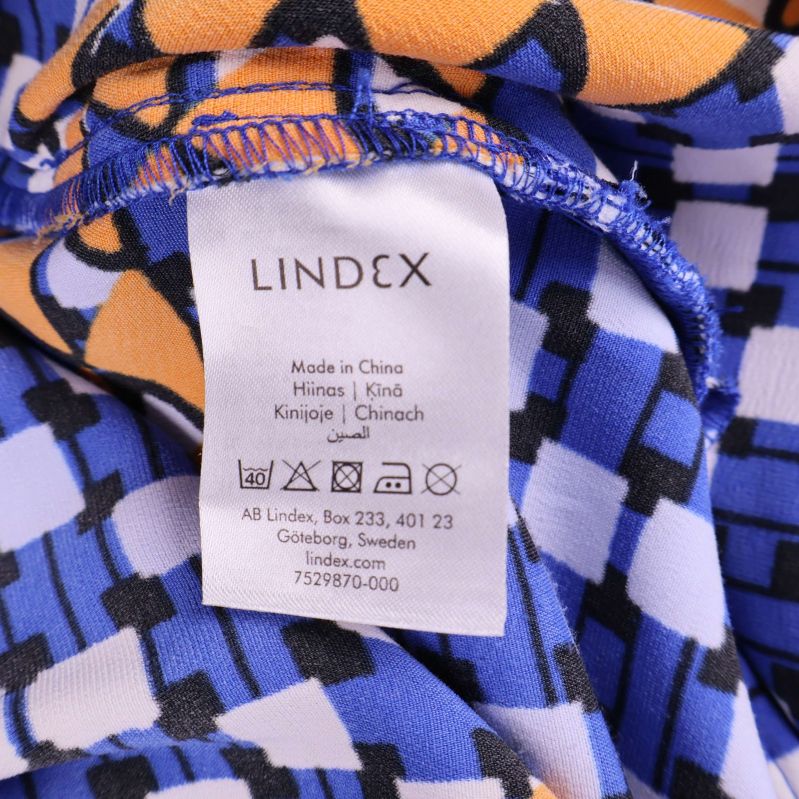 Varumärkestagg från Lindex i byxan