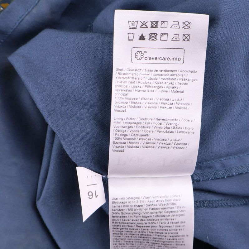 Detaljerad material- och tvättanvisningslapp invändigt