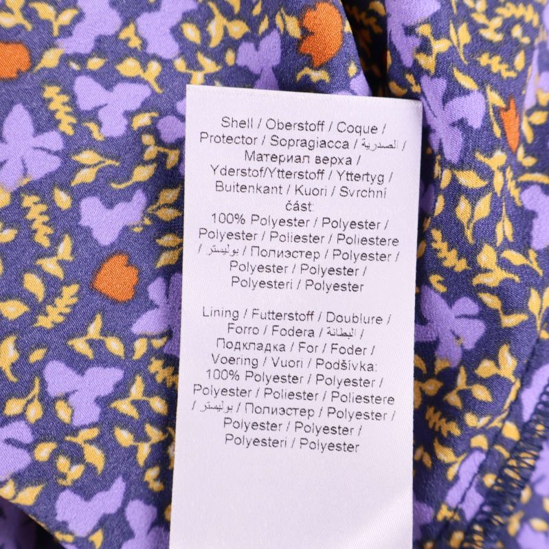 Materialetikett med 100% polyester för både yttertyg och foder