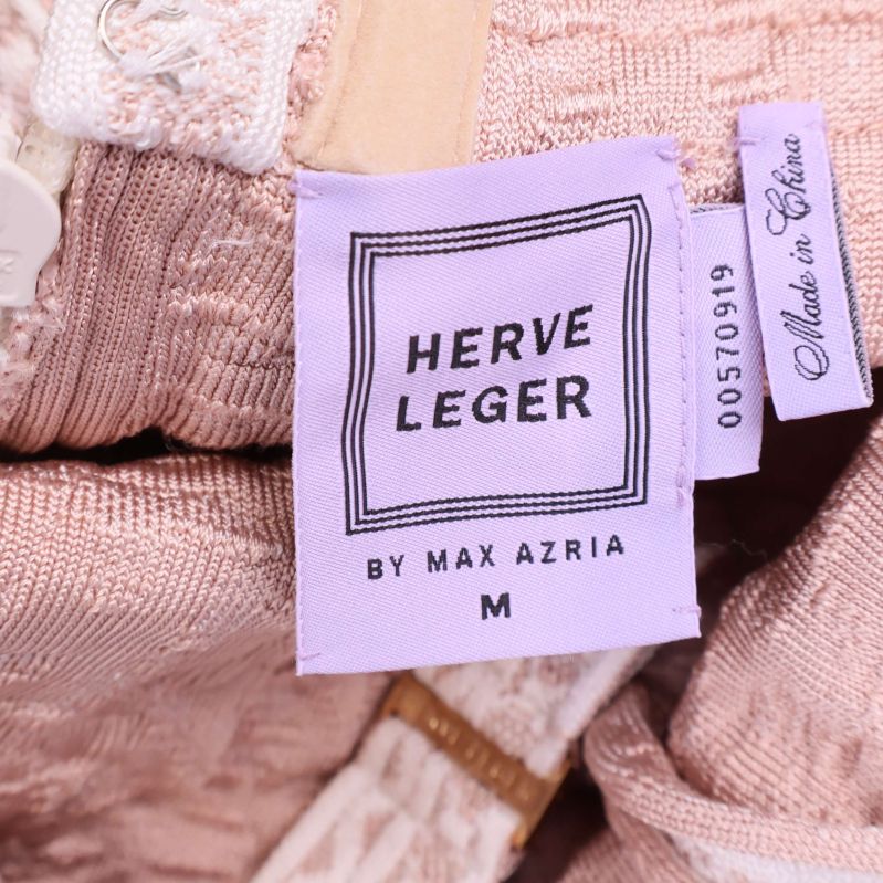 Herve Leger etikett med storlek M i lila