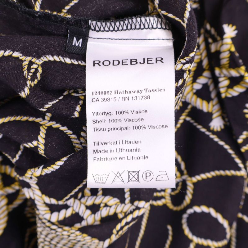 Materialetikett som visar 100% viskos