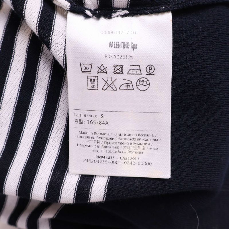 Material- och skötselrådsetikett för koftan från Red Valentino
