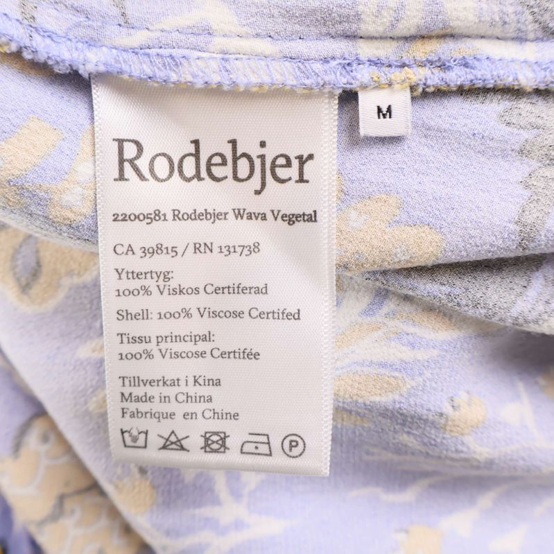 Materiallapp med Rodebjer och information om 100% viskos