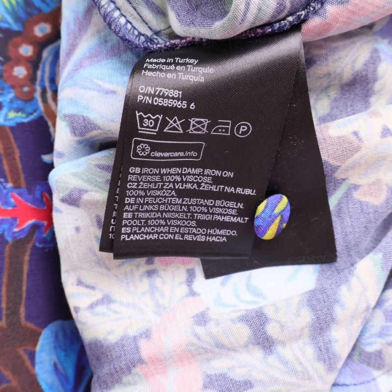 Material- och tvättanvisning med 95% viskos, 5% elastan