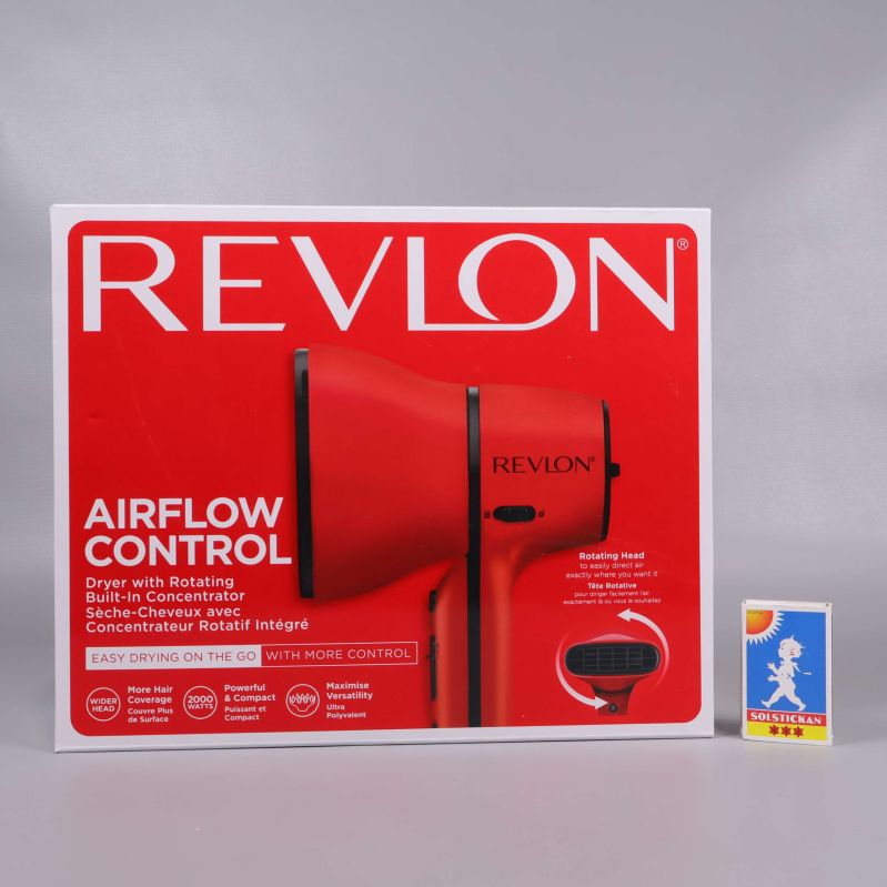 Röd Revlon hårfön i originalförpackning med tydlig logotyp