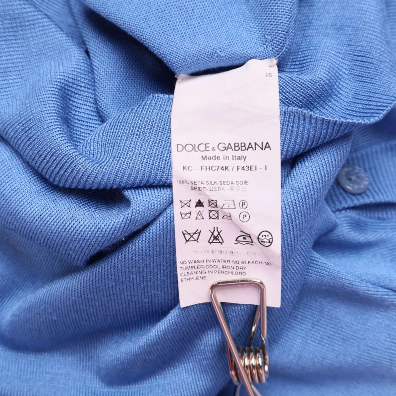 Materiallapp med skötselråd från Dolce & Gabbana