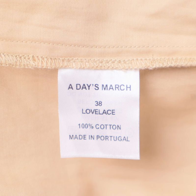 Materialetikett: 100% bomull, made in Portugal
