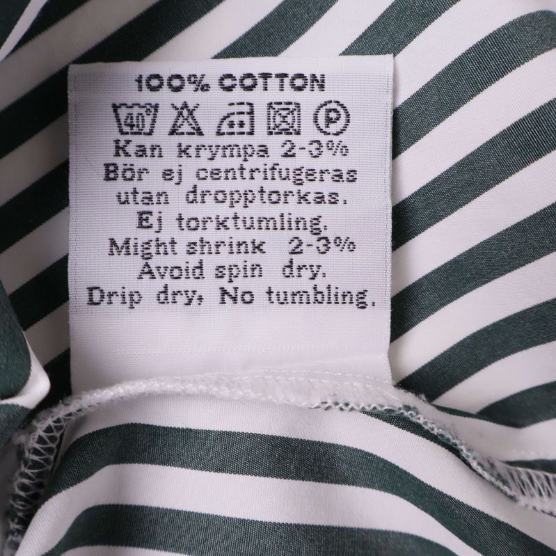 Materialetikett med skötselråd och material