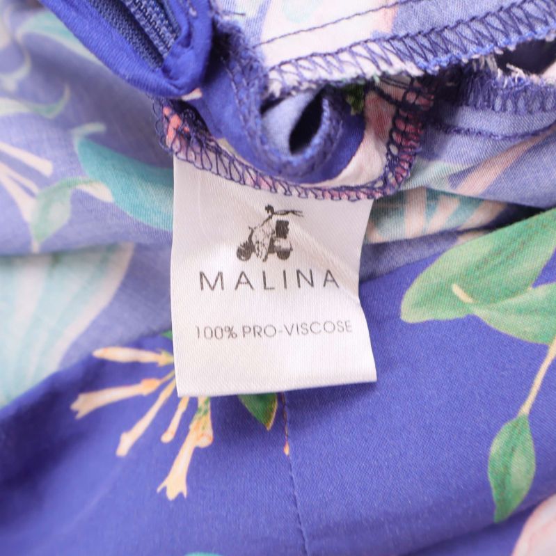 Materiallapp med texten 100% pro-viskos från Malina