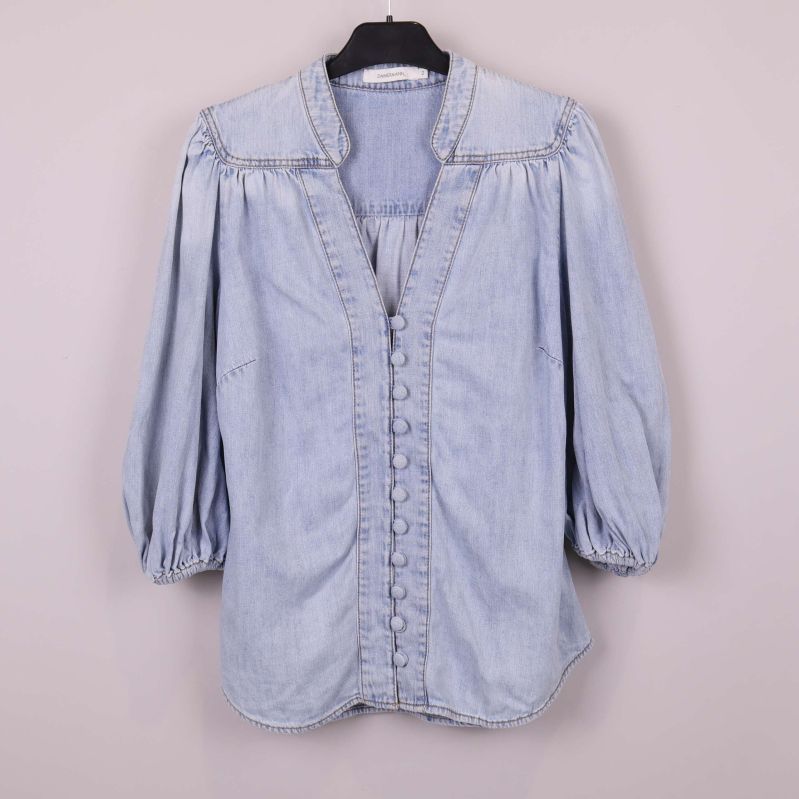 Ljus denimblus med puffärm på galge