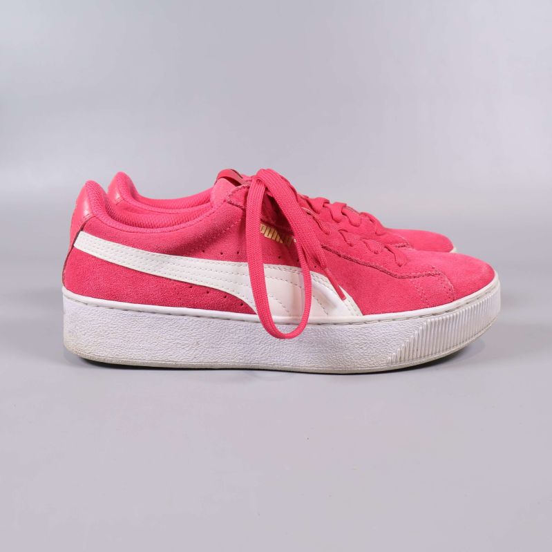 Profilbild på rosa sneakers med vit platåsula