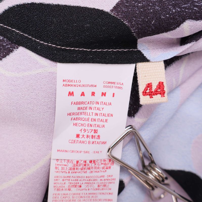 Tvättrådslapp på Marni klänning visar storlek 44 och made in Italy