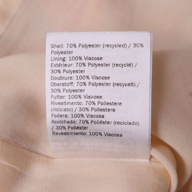 Materiallapp visar polyester och viskos sammansättning