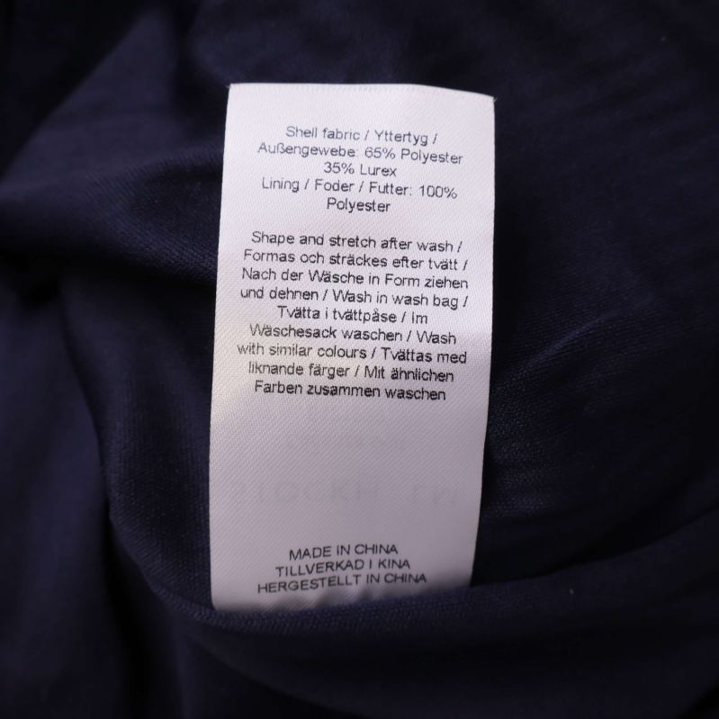 Materiallapp visar polyester och lurex för paljettkjol